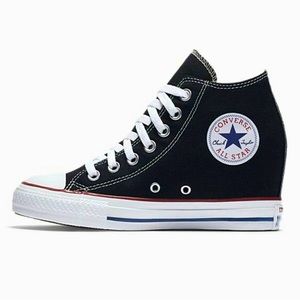 Hard to find Converse wedge black high tops